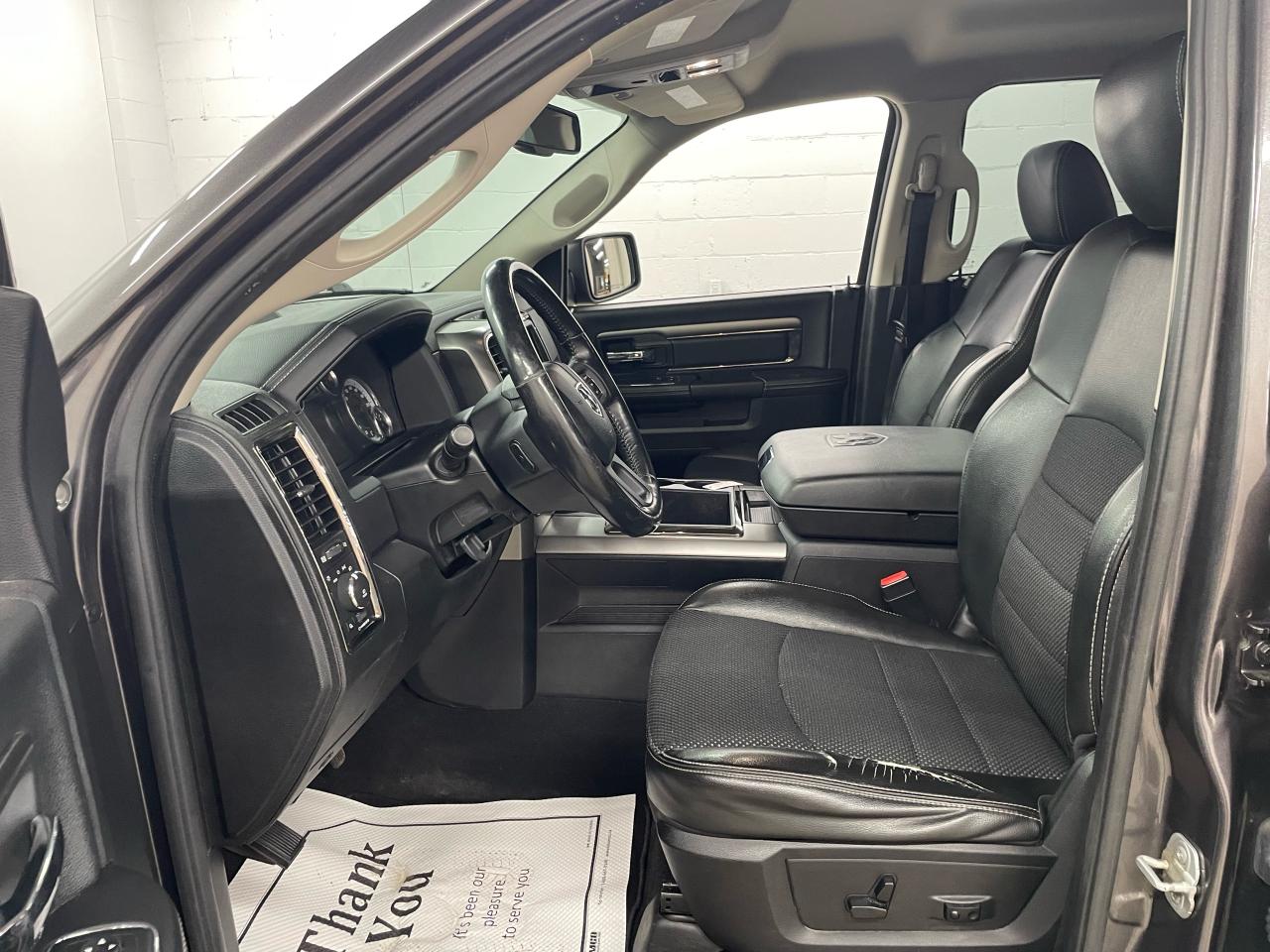 2014 RAM 1500 4WD QUAD CAB 140.5" SPORT Photo7