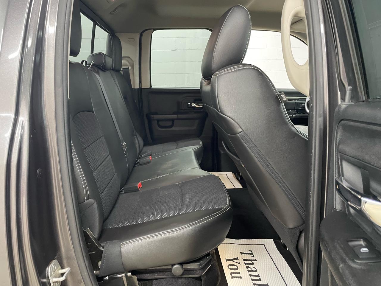 2014 RAM 1500 4WD QUAD CAB 140.5" SPORT Photo9