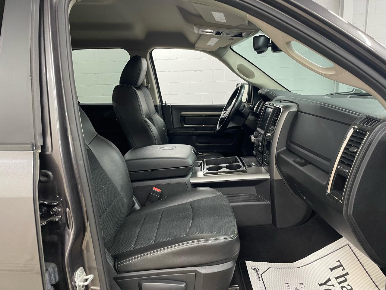 2014 RAM 1500 4WD QUAD CAB 140.5" SPORT Photo10