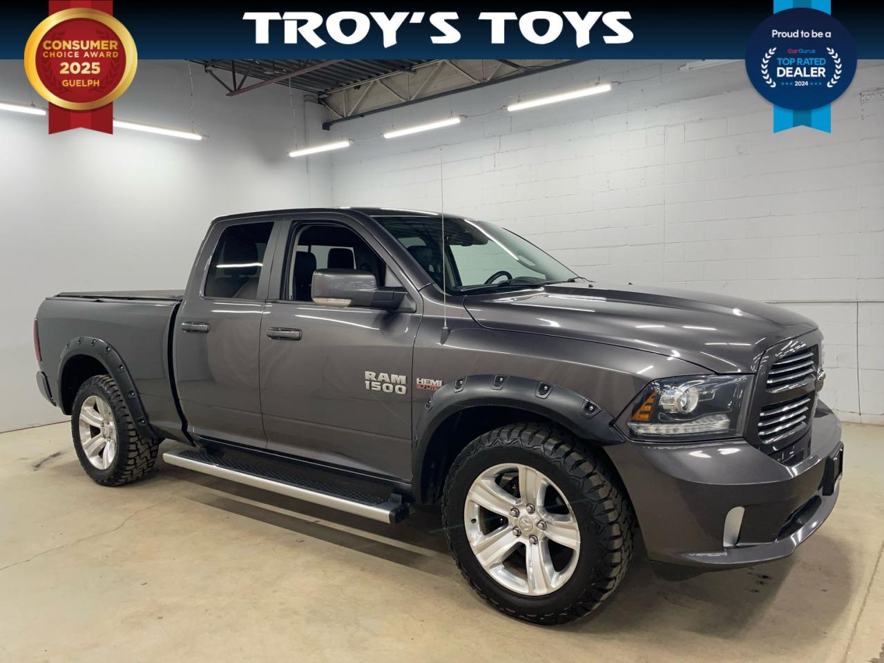 Used 2014 RAM 1500 4WD QUAD CAB 140.5