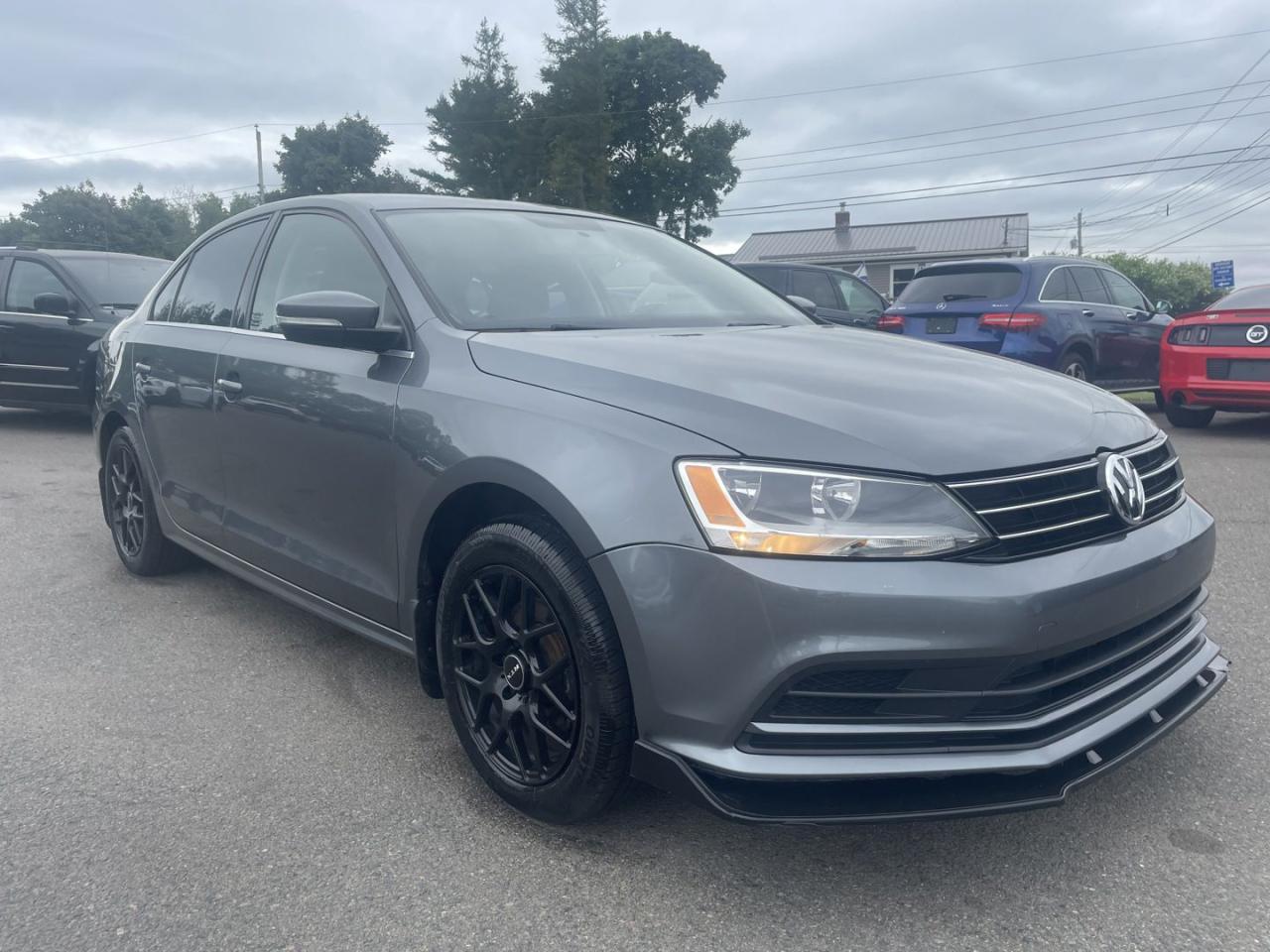 Used 2015 Volkswagen Jetta S MODEL / POWER SUNROOF / TOUCH SCREEN ENTERTAINMENT / HEATED SEATS /SPARE TIRES / AFTERMARKET RIMS for sale in Truro, NS