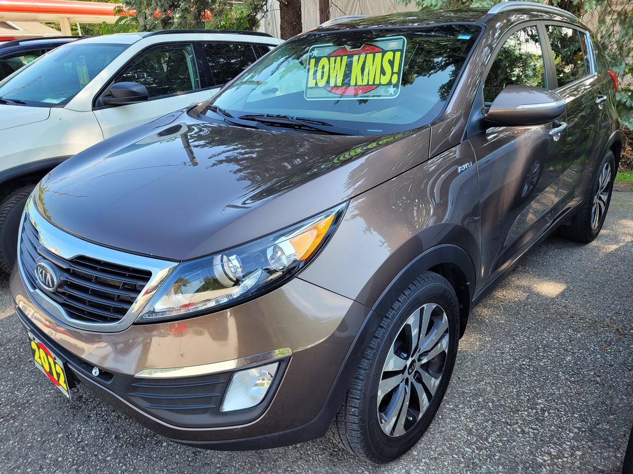 <p>One Owner, Accident Free, Certified, Dealer Serviced, Financing Available & Trade-ins Welcome!</p><p>TOYO Celcius CUV Tires</p><div class=WaaZC style=color: #001d35; font-family: Google Sans, Arial, sans-serif; font-size: 18px; background-color: #ffffff;><div class=RJPOee EIJn2 style=animation: auto ease 0s 1 normal none running none !important;><div class=rPeykc style=margin: 0px 0px 20px; hyphens: auto; data-hveid=CAMQAQ data-ved=2ahUKEwij99r5zOeNAxV9lYkEHcqLMS0Qo_EKegQIAxAB><span data-huuid=14477951495504257481>The 2012 Kia Sportage EX <mark class=QVRyCf style=background: none 0% 0% / auto repeat scroll padding-box border-box #d3e3fd; border-radius: 4px; padding: 0px 2px;>offers a balance of style, features, and performance in the compact SUV segment</mark>.&nbsp;</span><span data-huuid=14477951495504259302><span data-huuid=14477951495504259302>Its a popular choice for its value and practicality, but some customers have noted engine noise and rear legroom as potential drawbacks.<span class=pjBG2e data-cid=5a15d4c2-150f-4375-857b-32d4de766ed5><span class=UV3uM style=text-wrap-mode: nowrap;>&nbsp;</span></span></span></span><div class=NPrrbc style=margin-right: 6px; display: inline-flex; data-cid=5a15d4c2-150f-4375-857b-32d4de766ed5 data-uuids=14477951495504257481,14477951495504259302><div class=BMebGe btku5b fCrZyc LwdV0e FR7ZSc OJeuxf style=display: inline-block; vertical-align: middle; cursor: pointer; outline: 0px; -webkit-tap-highlight-color: transparent; color: #0b57d0; tabindex=0 role=button aria-label=View related links data-hveid=CAUQAQ data-ved=2ahUKEwij99r5zOeNAxV9lYkEHcqLMS0Q3fYKegQIBRAB><div class=niO4u style=display: flex; -webkit-box-pack: center; justify-content: center; position: relative; -webkit-box-align: stretch; align-items: stretch; width: 28px; background-color: transparent; border-radius: 9999px; margin: 0px auto; outline: transparent solid 1px; outline-offset: -1px; height: 20px; min-height: 20px;><div class=kHtcsd style=display: flex; -webkit-box-align: center; align-items: center; -webkit-box-pack: center; justify-content: center; width: 28px; border-radius: 9999px; height: 20px;>&nbsp;</div></div></div></div></div></div></div><div class=WaaZC style=color: #001d35; font-family: Google Sans, Arial, sans-serif; font-size: 18px; background-color: #ffffff;><div class=RJPOee EIJn2 style=animation: auto ease 0s 1 normal none running none !important;><div class=rPeykc pyPiTc style=margin: 20px 0px 10px; letter-spacing: 0px; line-height: 26px; data-hveid=CAwQAQ data-ved=2ahUKEwij99r5zOeNAxV9lYkEHcqLMS0Qo_EKegQIDBAB><span data-huuid=10337641779785175898>Key Features and Specs:</span></div></div></div><div class=WaaZC style=color: #001d35; font-family: Google Sans, Arial, sans-serif; font-size: 18px; background-color: #ffffff;><div class=RJPOee EIJn2 style=animation: auto ease 0s 1 normal none running none !important;><ul style=margin: 10px 0px 20px; padding: 0px 0px 0px 24px; font-size: 16px; line-height: 22px; data-hveid=CCoQAQ data-ved=2ahUKEwij99r5zOeNAxV9lYkEHcqLMS0Qm_YKegQIKhAB><li style=margin: 0px 0px 8px; padding: 0px 0px 0px 4px; list-style: inherit;><span data-huuid=10337641779785179061><strong>Standard Features:</strong>&nbsp;</span><span data-huuid=10337641779785178750><span data-huuid=10337641779785178750>The EX trim includes features like Kias UVO infotainment system, back-up warning system, push-button start, a cooling glovebox, and automatic climate control.<span class=pjBG2e data-cid=a9ab1fb2-396b-45f1-9524-d360fc170837><span class=UV3uM style=text-wrap-mode: nowrap;>&nbsp;</span></span></span></span><div class=NPrrbc style=margin-right: 6px; display: inline-flex; data-cid=a9ab1fb2-396b-45f1-9524-d360fc170837 data-uuids=10337641779785179061,10337641779785178750><div class=BMebGe btku5b fCrZyc LwdV0e FR7ZSc OJeuxf style=display: inline-block; vertical-align: middle; cursor: pointer; outline: 0px; -webkit-tap-highlight-color: transparent; color: #0b57d0; tabindex=0 role=button aria-label=View related links data-hveid=CBIQAQ data-ved=2ahUKEwij99r5zOeNAxV9lYkEHcqLMS0Q3fYKegQIEhAB><div class=niO4u style=display: flex; -webkit-box-pack: center; justify-content: center; position: relative; -webkit-box-align: stretch; align-items: stretch; width: 28px; background-color: transparent; border-radius: 9999px; margin: 0px auto; outline: transparent solid 1px; outline-offset: -1px; height: 20px; min-height: 20px;><div class=kHtcsd style=display: flex; -webkit-box-align: center; align-items: center; -webkit-box-pack: center; justify-content: center; width: 28px; border-radius: 9999px; height: 20px;>&nbsp;</div></div></div></div></li><li style=margin: 0px 0px 8px; padding: 0px 0px 0px 4px; list-style: inherit;><span data-huuid=10337641779785178128><strong>Engine:</strong>&nbsp;</span><span data-huuid=10337641779785177817>The EX is powered by a 2.4-liter I4 engine with 176 hp and 168 lb-ft of torque.&nbsp;</span><span data-huuid=10337641779785177506><span data-huuid=10337641779785177506>A turbocharged engine option is also available.<span class=pjBG2e data-cid=bf497b53-c4f7-40e3-878a-33fdc0a5b183><span class=UV3uM style=text-wrap-mode: nowrap;>&nbsp;</span></span></span></span><div class=NPrrbc style=margin-right: 6px; display: inline-flex; data-cid=bf497b53-c4f7-40e3-878a-33fdc0a5b183 data-uuids=10337641779785178128,10337641779785177817,10337641779785177506><div class=BMebGe btku5b fCrZyc LwdV0e FR7ZSc OJeuxf style=display: inline-block; vertical-align: middle; cursor: pointer; outline: 0px; -webkit-tap-highlight-color: transparent; color: #0b57d0; tabindex=0 role=button aria-label=View related links data-hveid=CB8QAQ data-ved=2ahUKEwij99r5zOeNAxV9lYkEHcqLMS0Q3fYKegQIHxAB><div class=niO4u style=display: flex; -webkit-box-pack: center; justify-content: center; position: relative; -webkit-box-align: stretch; align-items: stretch; width: 28px; background-color: transparent; border-radius: 9999px; margin: 0px auto; outline: transparent solid 1px; outline-offset: -1px; height: 20px; min-height: 20px;><div class=kHtcsd style=display: flex; -webkit-box-align: center; align-items: center; -webkit-box-pack: center; justify-content: center; width: 28px; border-radius: 9999px; height: 20px;>&nbsp;</div></div></div></div></li><li style=margin: 0px 0px 8px; padding: 0px 0px 0px 4px; list-style: inherit;><span data-huuid=10337641779785176884><strong>Transmission:</strong>&nbsp;</span><span data-huuid=10337641779785176573><span data-huuid=10337641779785176573>A 6-speed Steptronic automatic transmission is standard.<span class=pjBG2e data-cid=8627eb30-b80b-42ab-a7e7-f85e404ced3b><span class=UV3uM style=text-wrap-mode: nowrap;>&nbsp;</span></span></span></span><div class=NPrrbc style=margin-right: 6px; display: inline-flex; data-cid=8627eb30-b80b-42ab-a7e7-f85e404ced3b data-uuids=10337641779785176884,10337641779785176573><div class=BMebGe btku5b fCrZyc LwdV0e FR7ZSc OJeuxf style=display: inline-block; vertical-align: middle; cursor: pointer; outline: 0px; -webkit-tap-highlight-color: transparent; color: #0b57d0; tabindex=0 role=button aria-label=View related links data-hveid=CCMQAQ data-ved=2ahUKEwij99r5zOeNAxV9lYkEHcqLMS0Q3fYKegQIIxAB><div class=niO4u style=display: flex; -webkit-box-pack: center; justify-content: center; position: relative; -webkit-box-align: stretch; align-items: stretch; width: 28px; background-color: transparent; border-radius: 9999px; margin: 0px auto; outline: transparent solid 1px; outline-offset: -1px; height: 20px; min-height: 20px;><div class=kHtcsd style=display: flex; -webkit-box-align: center; align-items: center; -webkit-box-pack: center; justify-content: center; width: 28px; border-radius: 9999px; height: 20px;>&nbsp;</div></div></div></div></li><li style=margin: 0px 0px 8px; padding: 0px 0px 0px 4px; list-style: inherit;><span data-huuid=10337641779785175951><strong>Drivetrain:</strong>&nbsp;</span><span data-huuid=10337641779785175640><span data-huuid=10337641779785175640>Its available in front-wheel drive and all-wheel drive configurations.<span class=pjBG2e data-cid=35cae41b-fcdc-4d56-aa1f-878bb56ba2cc><span class=UV3uM style=text-wrap-mode: nowrap;>&nbsp;</span></span></span></span><div class=NPrrbc style=margin-right: 6px; display: inline-flex; data-cid=35cae41b-fcdc-4d56-aa1f-878bb56ba2cc data-uuids=10337641779785175951,10337641779785175640><div class=BMebGe btku5b fCrZyc LwdV0e FR7ZSc OJeuxf style=display: inline-block; vertical-align: middle; cursor: pointer; outline: 0px; -webkit-tap-highlight-color: transparent; color: #0b57d0; tabindex=0 role=button aria-label=View related links data-hveid=CCYQAQ data-ved=2ahUKEwij99r5zOeNAxV9lYkEHcqLMS0Q3fYKegQIJhAB><div class=niO4u style=display: flex; -webkit-box-pack: center; justify-content: center; position: relative; -webkit-box-align: stretch; align-items: stretch; width: 28px; background-color: transparent; border-radius: 9999px; margin: 0px auto; outline: transparent solid 1px; outline-offset: -1px; height: 20px; min-height: 20px;><div class=kHtcsd style=display: flex; -webkit-box-align: center; align-items: center; -webkit-box-pack: center; justify-content: center; width: 28px; border-radius: 9999px; height: 20px;>&nbsp;</div></div></div></div></li><li style=margin: 0px 0px 8px; padding: 0px 0px 0px 4px; list-style: inherit;><span data-huuid=10337641779785179114><strong>Performance:</strong>&nbsp;</span><span data-huuid=10337641779785178803><span data-huuid=10337641779785178803>While not a sports car, it offers decent acceleration and handling, especially in the all-wheel-drive variant.<span class=pjBG2e data-cid=69a9ab8b-bcf5-411d-b07d-86d92b1fd85f><span class=UV3uM style=text-wrap-mode: nowrap;>&nbsp;</span></span></span></span><div class=NPrrbc style=margin-right: 6px; display: inline-flex; data-cid=69a9ab8b-bcf5-411d-b07d-86d92b1fd85f data-uuids=10337641779785179114,10337641779785178803><div class=BMebGe btku5b fCrZyc LwdV0e FR7ZSc OJeuxf style=display: inline-block; vertical-align: middle; cursor: pointer; outline: 0px; -webkit-tap-highlight-color: transparent; color: #0b57d0; tabindex=0 role=button aria-label=View related links data-hveid=CCQQAQ data-ved=2ahUKEwij99r5zOeNAxV9lYkEHcqLMS0Q3fYKegQIJBAB><div class=niO4u style=display: flex; -webkit-box-pack: center; justify-content: center; position: relative; -webkit-box-align: stretch; align-items: stretch; width: 28px; background-color: transparent; border-radius: 9999px; margin: 0px auto; outline: transparent solid 1px; outline-offset: -1px; height: 20px; min-height: 20px;><div class=kHtcsd style=display: flex; -webkit-box-align: center; align-items: center; -webkit-box-pack: center; justify-content: center; width: 28px; border-radius: 9999px; height: 20px;>&nbsp;</div></div></div></div></li><li style=margin: 0px; padding: 0px 0px 0px 4px; list-style: inherit;><span data-huuid=10337641779785178181><strong>Resale Value:</strong>&nbsp;</span><span data-huuid=10337641779785177870>The Kia Sportage generally holds its value well, making it a smart buy for those looking for a reliable and practical SUV.<span class=pjBG2e data-cid=cd486fff-9d15-49eb-9b9e-83516afed80f><span class=UV3uM style=text-wrap-mode: nowrap;>&nbsp;</span></span></span></li></ul></div></div>