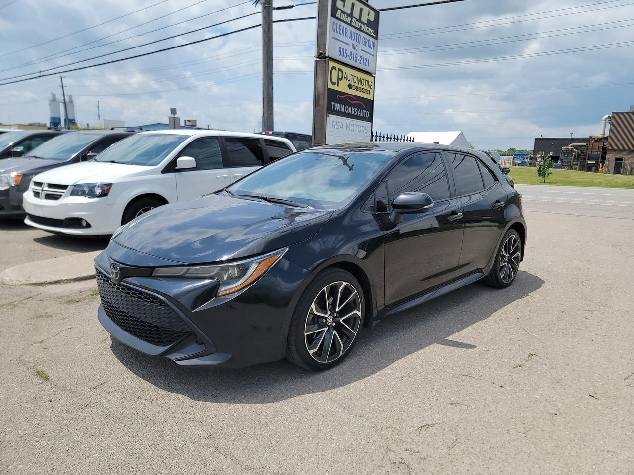 <p><strong>For Sale: 2019 Toyota Corolla SE Hatchback &ndash; Sporty, Efficient, and Loaded with Features</strong></p><p>This sharp-looking Corolla SE Hatchback delivers sporty styling, impressive fuel economy, and Toyotas trusted reliability. Clean and well-maintained, it&rsquo;s a great choice for daily commuting or weekend cruising.</p><p><strong>Features include:</strong></p><ul><li><p>2.0L 4-cylinder engine with automatic transmission</p></li><li><p>Sport-tuned suspension</p></li><li><p>Toyota Safety Sense (Pre-Collision System, Lane Departure Alert, Lane Tracing Assist, Automatic High Beams, Dynamic Radar Cruise Control)</p></li><li><p>8&rdquo; touchscreen display</p></li><li><p>Apple CarPlay & Android Auto compatibility</p></li><li><p>Bluetooth connectivity</p></li><li><p>Backup camera</p></li><li><p>Keyless entry with push-button start</p></li><li><p>Sport fabric seats with leatherette trim</p></li><li><p>Heated front seats</p></li><li><p>Power windows, locks, and mirrors</p></li><li><p>Automatic climate control</p></li><li><p>LED headlights and LED daytime running lights</p></li><li><p>18&rdquo; alloy wheels</p></li><li><p>Rear spoiler</p></li><li><p>Split-folding rear seats for extra cargo space</p></li><li><p>Local Ontario vehicle.. CarFax Available.</p></li></ul><p>Well-equipped and fun to drive, this Corolla SE Hatchback offers great value with modern tech and safety features. Reach out today to book a test drive!</p><p><strong>Additional Certification Cost</strong>: The full certification cost for this vehicle is <strong>$790 + HST</strong>.</p><p><strong>What&rsquo;s Included with Certification</strong>:</p><ul><li>The vehicle will be delivered with a <strong>valid safety certification</strong> and a <strong>36-day safety item warranty</strong> for your peace of mind.</li><li>A <strong>fresh oil change</strong> will be performed, and all fluids will be topped up.</li><li>The vehicle will be <strong>professionally detailed</strong>, ensuring it looks and feels like new when you pick it up.</li></ul><p>At <strong>Twin Oaks Auto</strong>, we are committed to providing a <strong>hassle-free car buying experience</strong>. From your first inquiry to driving off in your new car, our goal is to get you on the road quickly and stress-free!</p><p><strong>Financing Options Available!</strong><br />Flexible financing options are available to suit your needs. Contact us for more details.</p><p><strong>Contact Us Today</strong>:<br />📞 <strong>Call Us</strong>: 905-339-3330<br />📍 <strong>Location</strong>: 2470 Royal Windsor Drive, Oakville, Ontario, L6J 7Y2</p><p><br />(Conveniently located between Ford Drive and Winston Churchill Blvd.)</p><p><strong>More Information</strong>:<br />Visit our website at <strong><a href=http://www.twinoaksauto.com>TwinOaksAuto.com</a></strong> to view additional pictures, explore our inventory, and access CARFAX reports.</p>