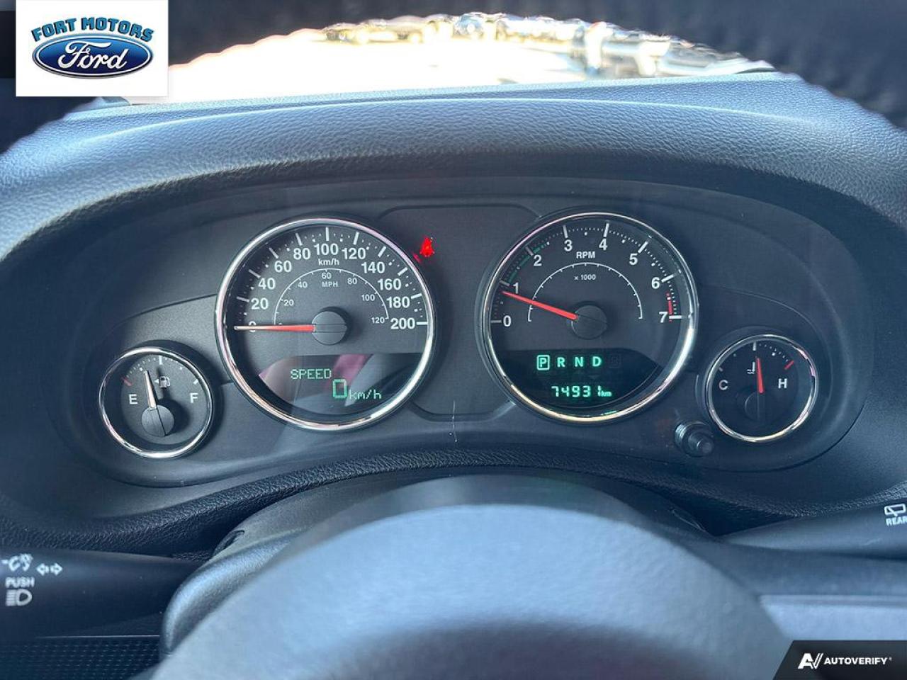 12628386