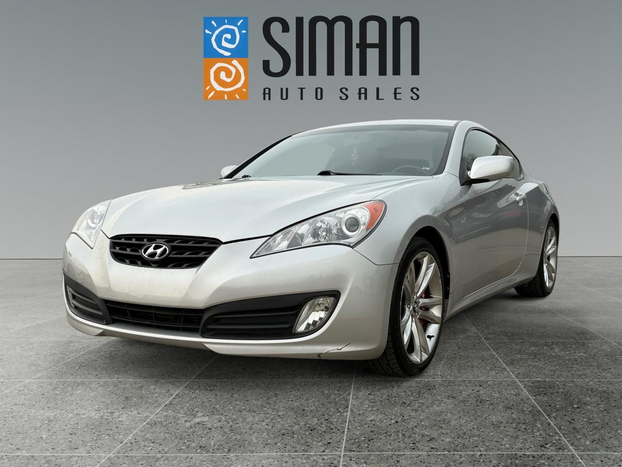 ## ?? **Unleash Your Inner Driver: 2010 Hyundai Genesis Coupe 2.0T**

**Was $13,000 | Now Only $10,988!**

Looking for a **sporty coupe** that delivers excitement without breaking the bank? Look no further! This stunning 2010 Hyundai Genesis Coupe 2.0T is the perfect blend of performance and value.

### **Key Highlights:**

* **Exceptional Price:** Priced to move quickly! Save over $2,000 on this sharp coupe.
* **Ultra Low Mileage:** With only **87,600 kilometers**, this Genesis Coupe has plenty of life left to explore the open road.
* **Peace of Mind:** A clean **Carfax report** confirms this is a true **Saskatchewan Vehicle** with **no serious collisions** reported.
* **Well Maintained:** Drive confidently knowing this vehicle comes with **excellent service records**.

### **Your Next Step is Easy:**

* **Trades are Encouraged!** Bring in your current vehicle for a competitive appraisal.
* **Protection for Your Investment:** We offer a variety of **aftermarket warranties** designed to fit every need and budget, ensuring worry-free driving.

### **Experience the Siman Auto Sales Difference**

At **Siman Auto Sales**, we are:
> **Large enough to make a difference and small enough to care.**

We have been proudly **serving Saskatchewan for over 26 years** and have **over 70 vehicles to choose from**. Dont just take our word for it**check our stellar reviews** and see why our customers keep coming back!

**Visit us today to test drive this fantastic deal!**