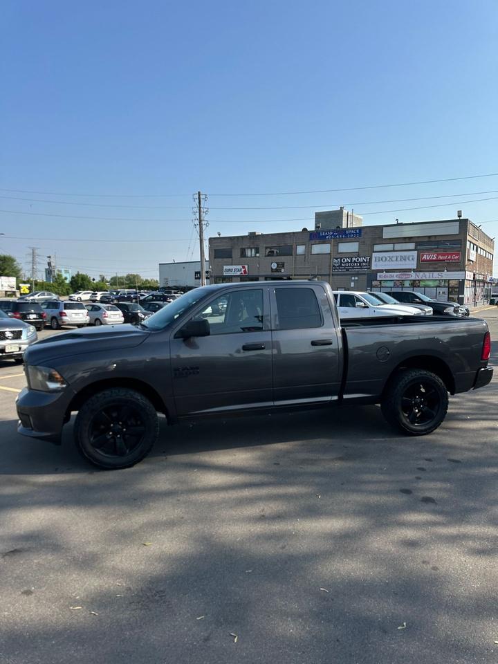 2019 RAM 1500 Classic Express 4x4 Quad Cab 6'4" Box Photo