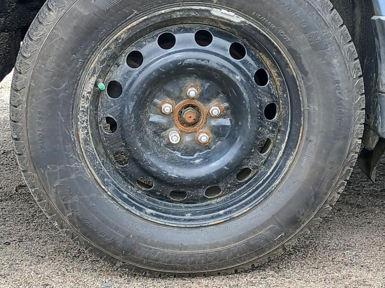 12633336