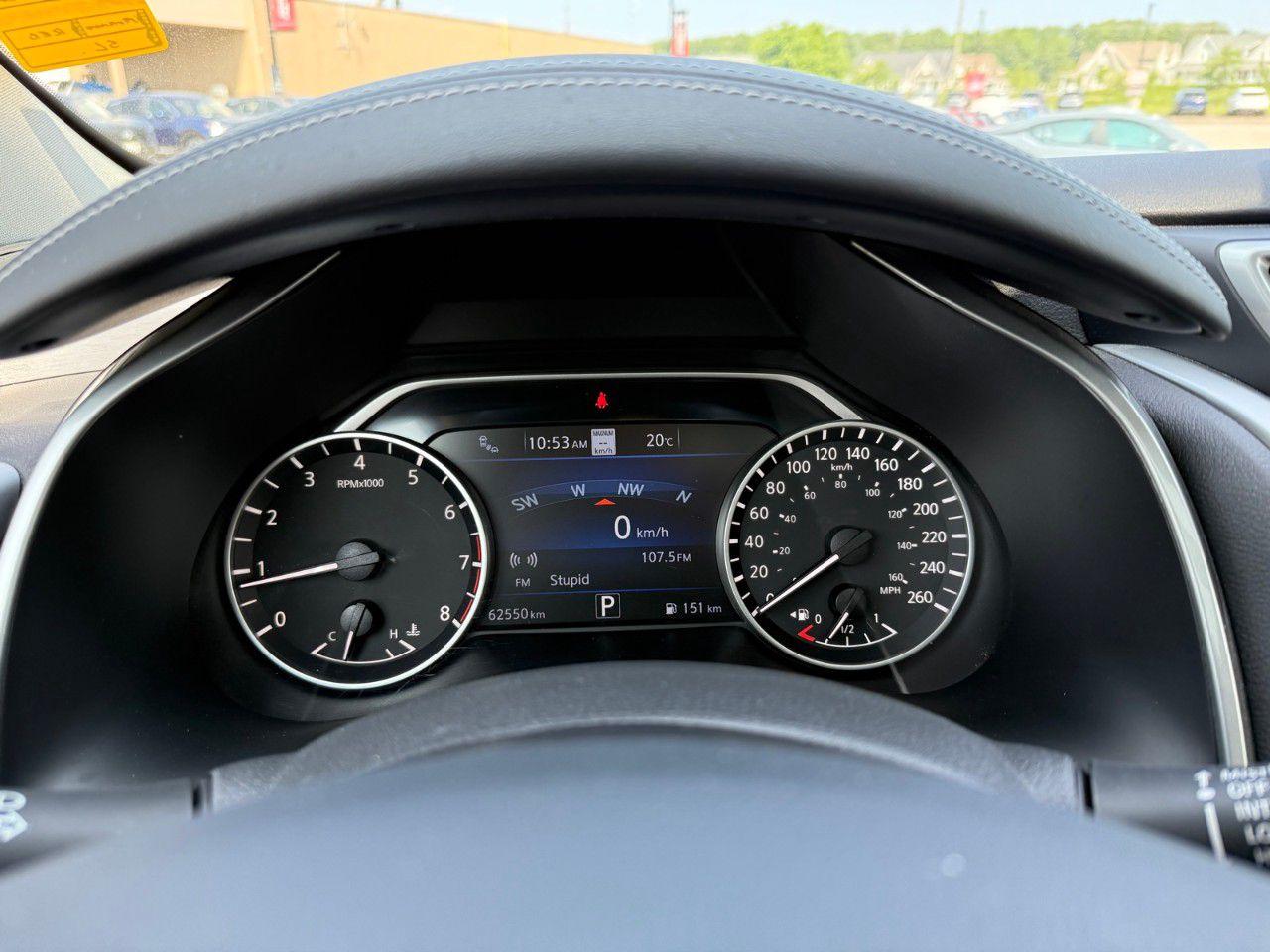 12634077