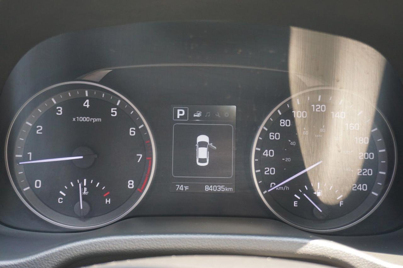 12635052