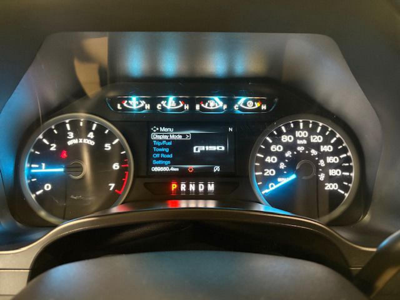 12635895