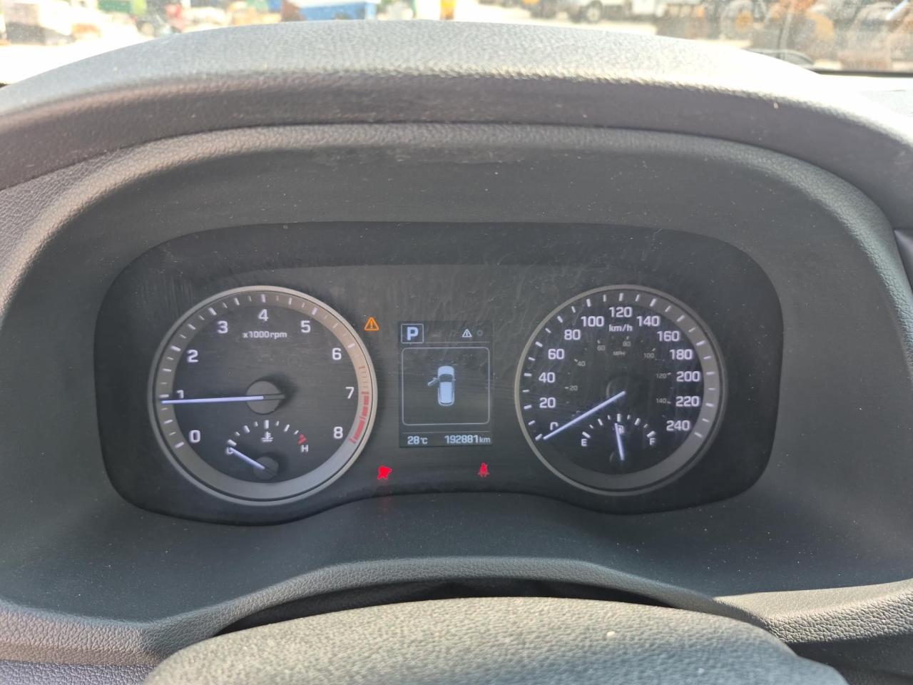 12635991