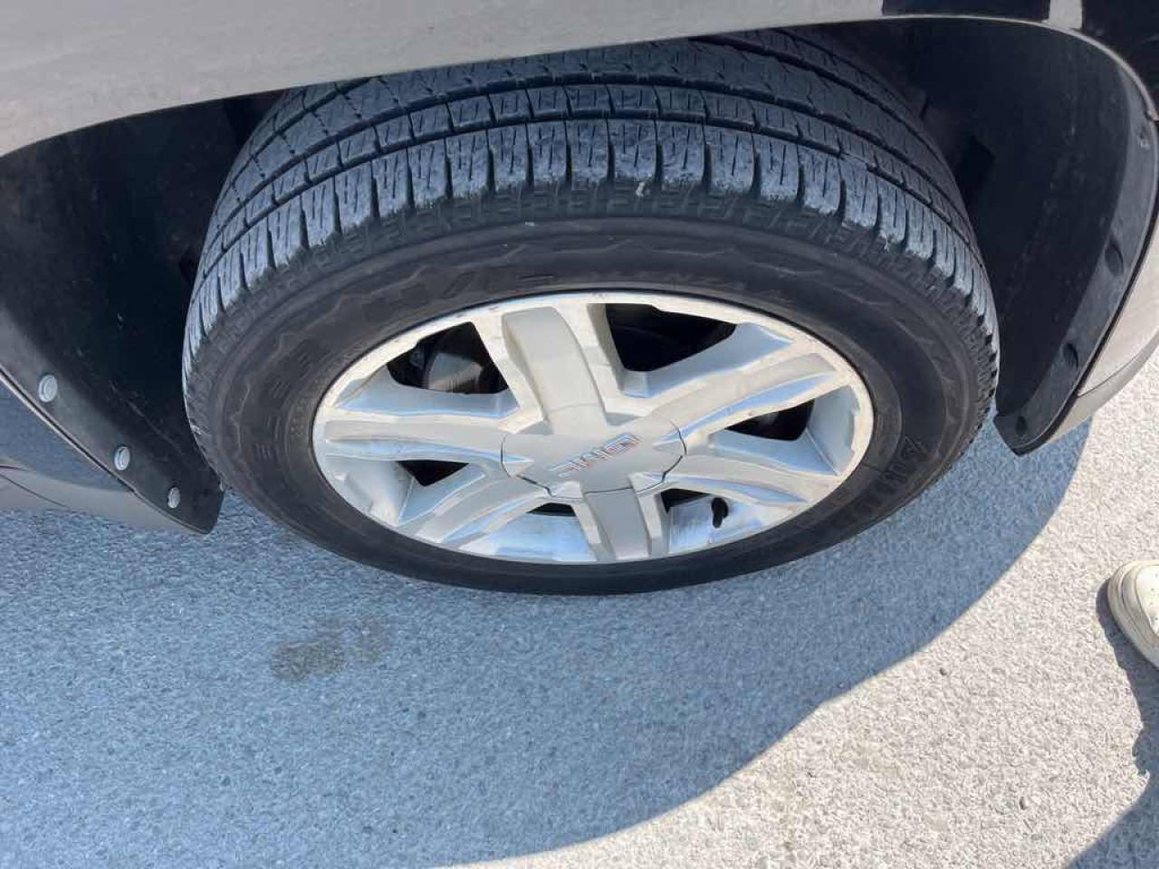 12636069