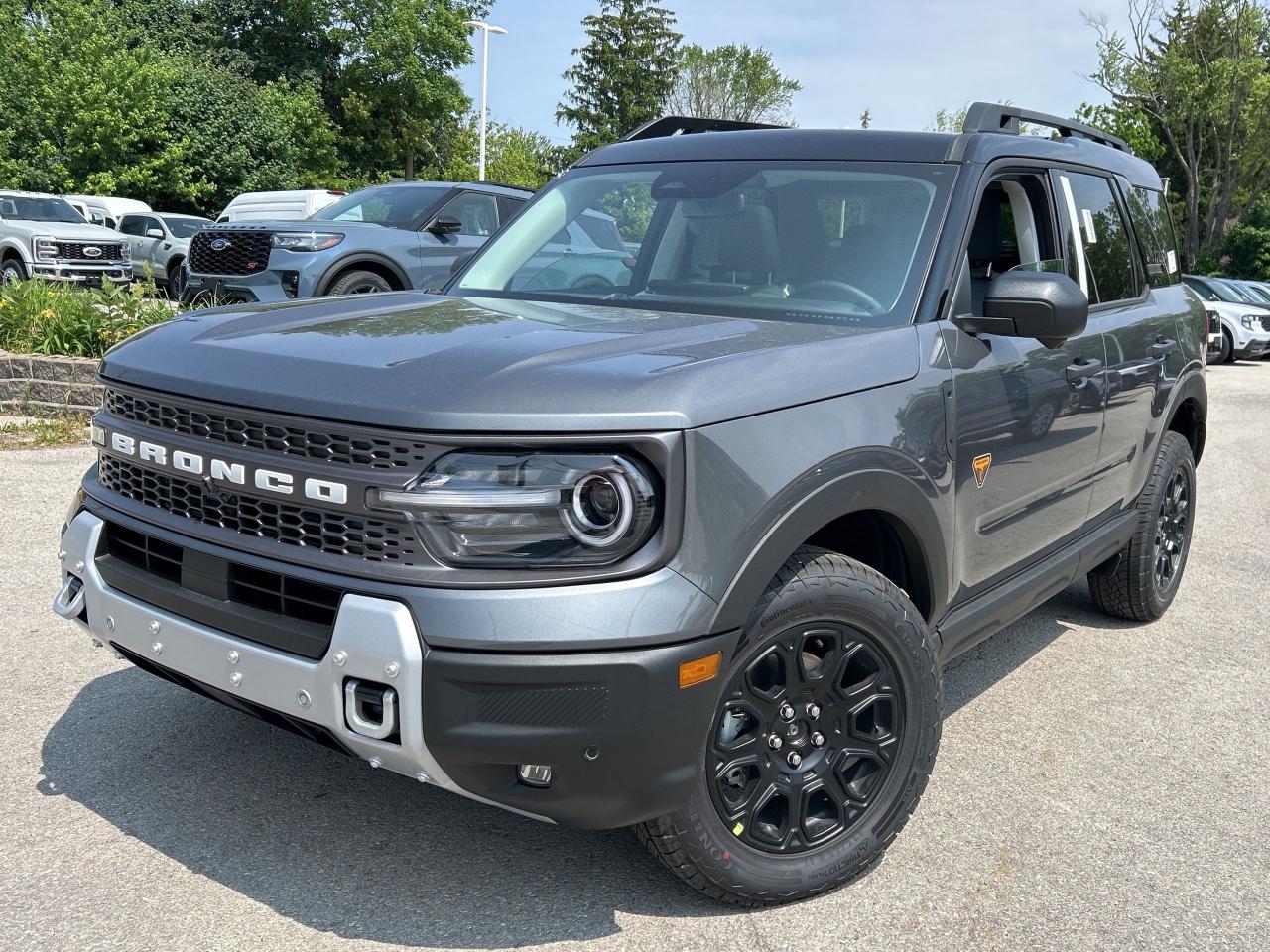 Off-Road Package, Heated Seats, SiriusXM, Apple CarPlay, Android Auto, Remote Start, Blind Spot Detection, Lane Keep Assist, Lane Departure Warning, Forward Collision Alert, LED Lights, 4G WiFi, Proximity Key, Rear Camera           Why Buy From Winegard Ford?   * No Administration fees  * No Additional Charges for Factory Orders  * 100 Point Inspection on All Used Vehicles  * Full Tank of Fuel with Every New or Used Vehicle Purchase  * Licensed Ford Accessories Available  *  Window Tinting Available  * Custom Truck Lift and Leveling Packages Available         Looking for off-roading capability with a mix off efficiency and tech features? This Bronco Sport is certainly up to the challenge.      A compact footprint, an iconic name, and modern luxury come together to make this Bronco Sport an instant classic. Whether your next adventure takes you deep into the rugged wilds, or into the rough and rumble city, this Bronco Sport is exactly what you need. With enough cargo space for all of your gear, the capability to get you anywhere, and a manageable footprint, theres nothing quite like this Ford Bronco Sport.      This carbonized grey metallic SUV  has an automatic transmission and is powered by a  250HP 2.0L 4 Cylinder Engine.      Our Bronco Sports trim level is Badlands. Rugged and capable, this Bronco Sport Badlands is ready for your next off-road adventure, with beefy off-road suspension, a reinforced undercarriage with 4 skid plates, off-road wheels, and front tow hooks. Also standard include heated seats with SiriusXM streaming radio and exclusive aluminum wheels. This SUV also features a slew of standard infotainment and convenience features, including voice-activated automatic air conditioning, a 12-inch SYNC 4 powered infotainment screen with Apple CarPlay and Android Auto, smart charging USB type-A and type-C ports, 4G LTE mobile hotspot internet access, proximity keyless entry with remote start, and a robust terrain management system that features the trademark Go Over All Terrain (G.O.A.T.) driving modes. Additional features include blind spot detection, rear cross traffic alert and pre-collision assist with automatic emergency braking, lane keeping assist, lane departure warning, forward collision alert, driver monitoring alert, a rear-view camera, 3 12-volt DC and 120-volt AC power outlets, and so much more.      View the original window sticker for this vehicle with this url http://www.windowsticker.forddirect.com/windowsticker.pdf?vin=3FMCR9DA9SRE78460.     To apply right now for financing use this link : http://www.winegardford.com/financing/application.htm         Weve discounted this vehicle $750.    0% financing for 60 months. 1.99% financing for 84 months.    Buy this vehicle now for the lowest bi-weekly payment of $350.64 with $0 down for 84 months @ 1.99% APR O.A.C. ( taxes included, $13 documentation fee   / Total cost of borrowing $4267   ).  Incentives expire 2025-06-30.  See dealer for details.       o~o