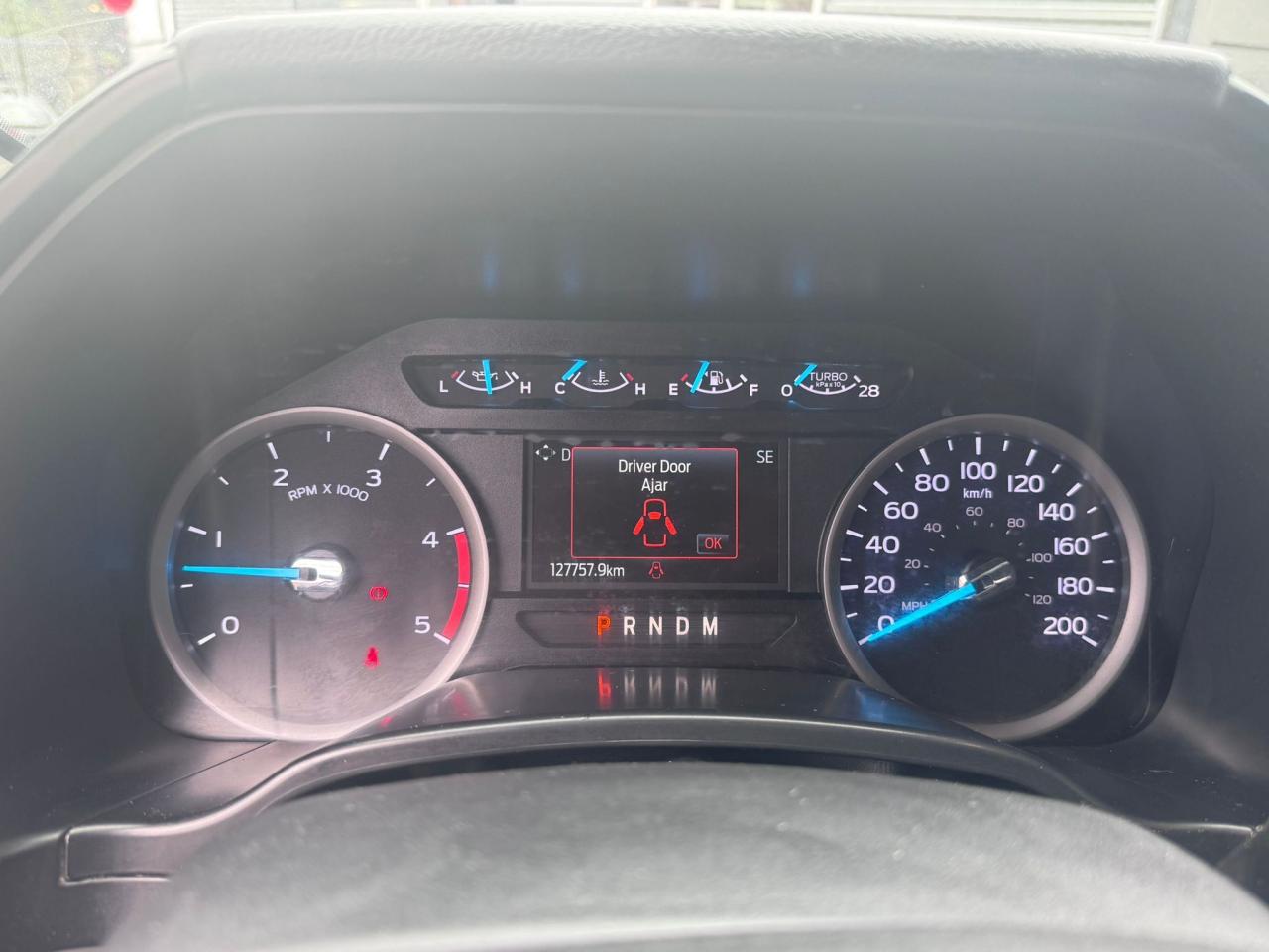 12637560