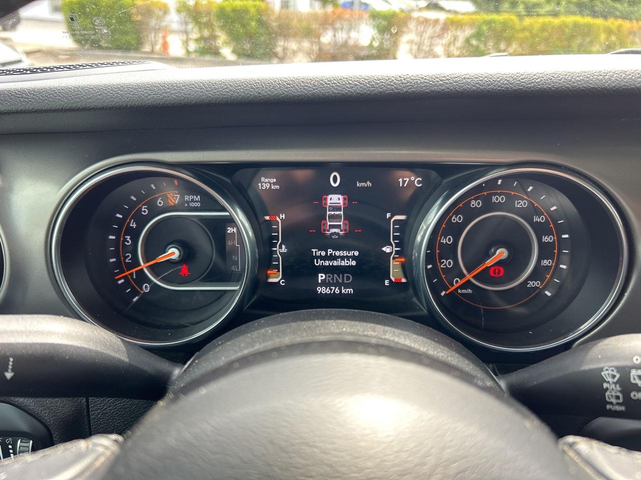12637566