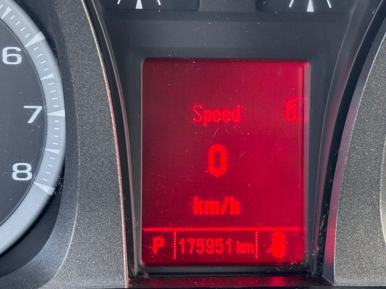 12637740