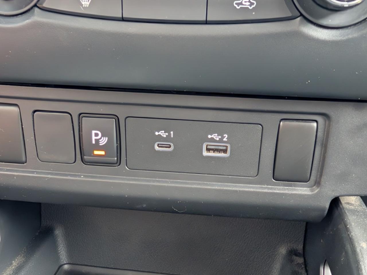 12637854