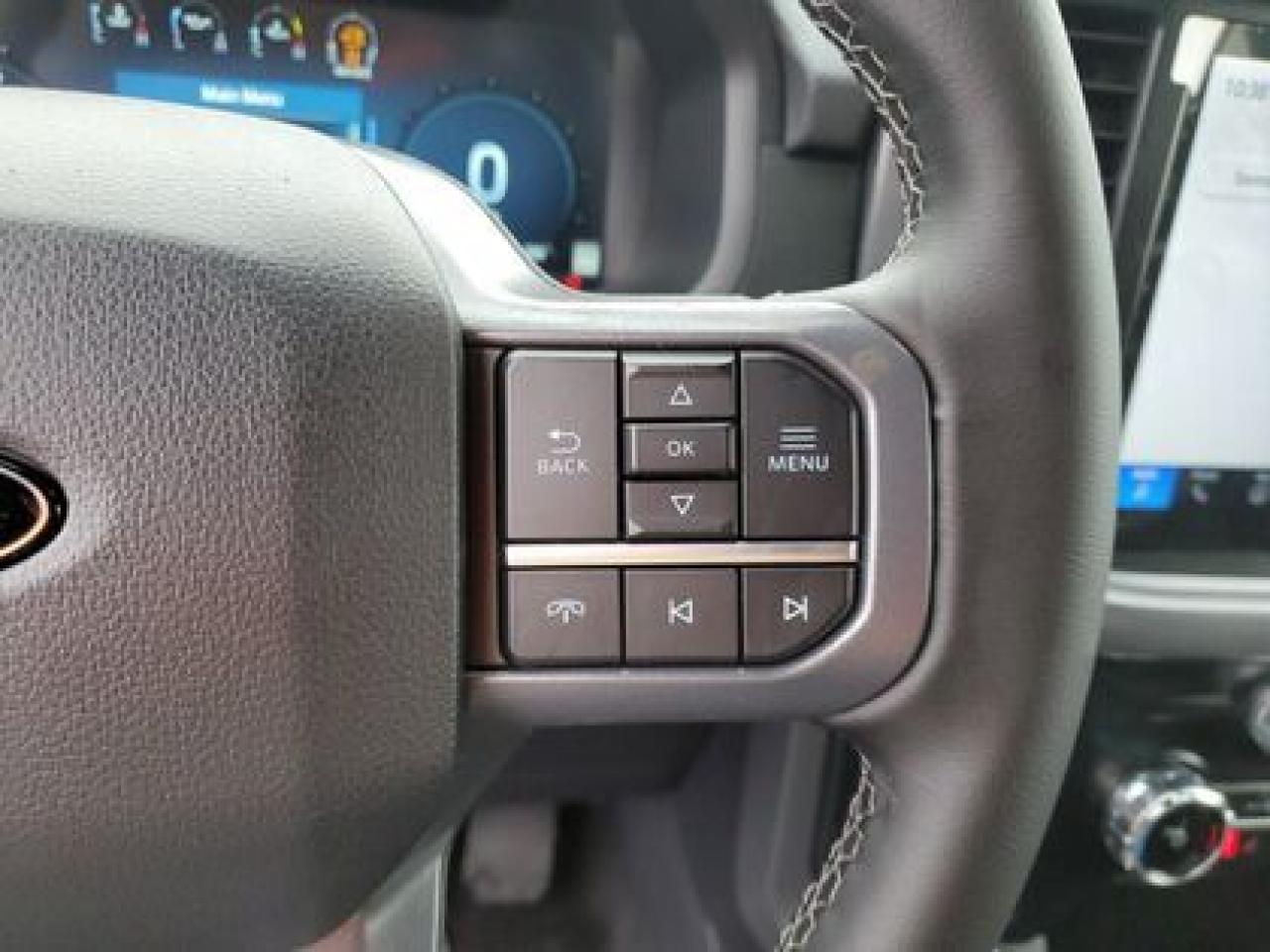 12640323