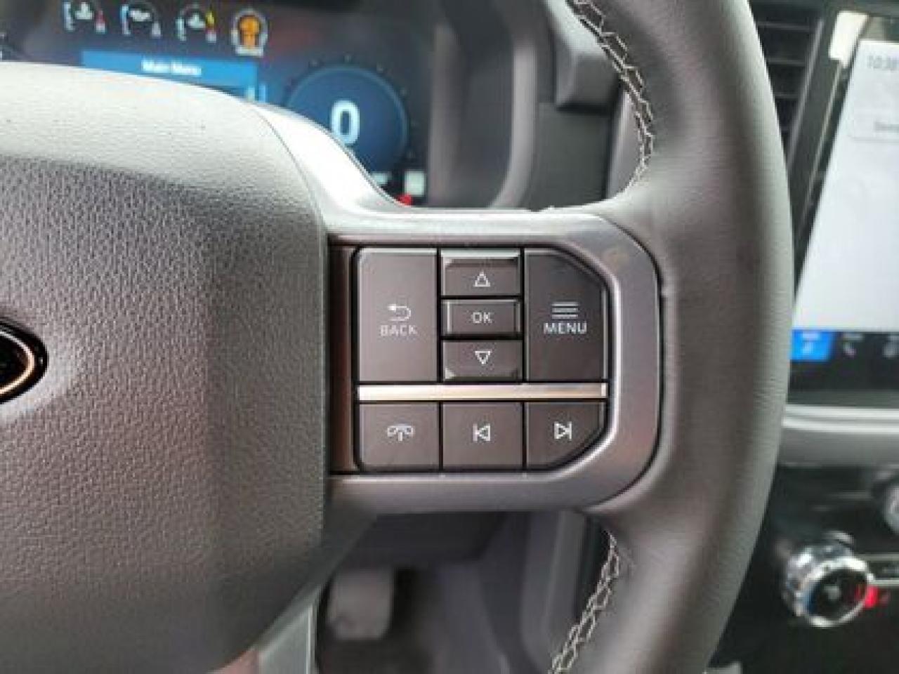 12640323