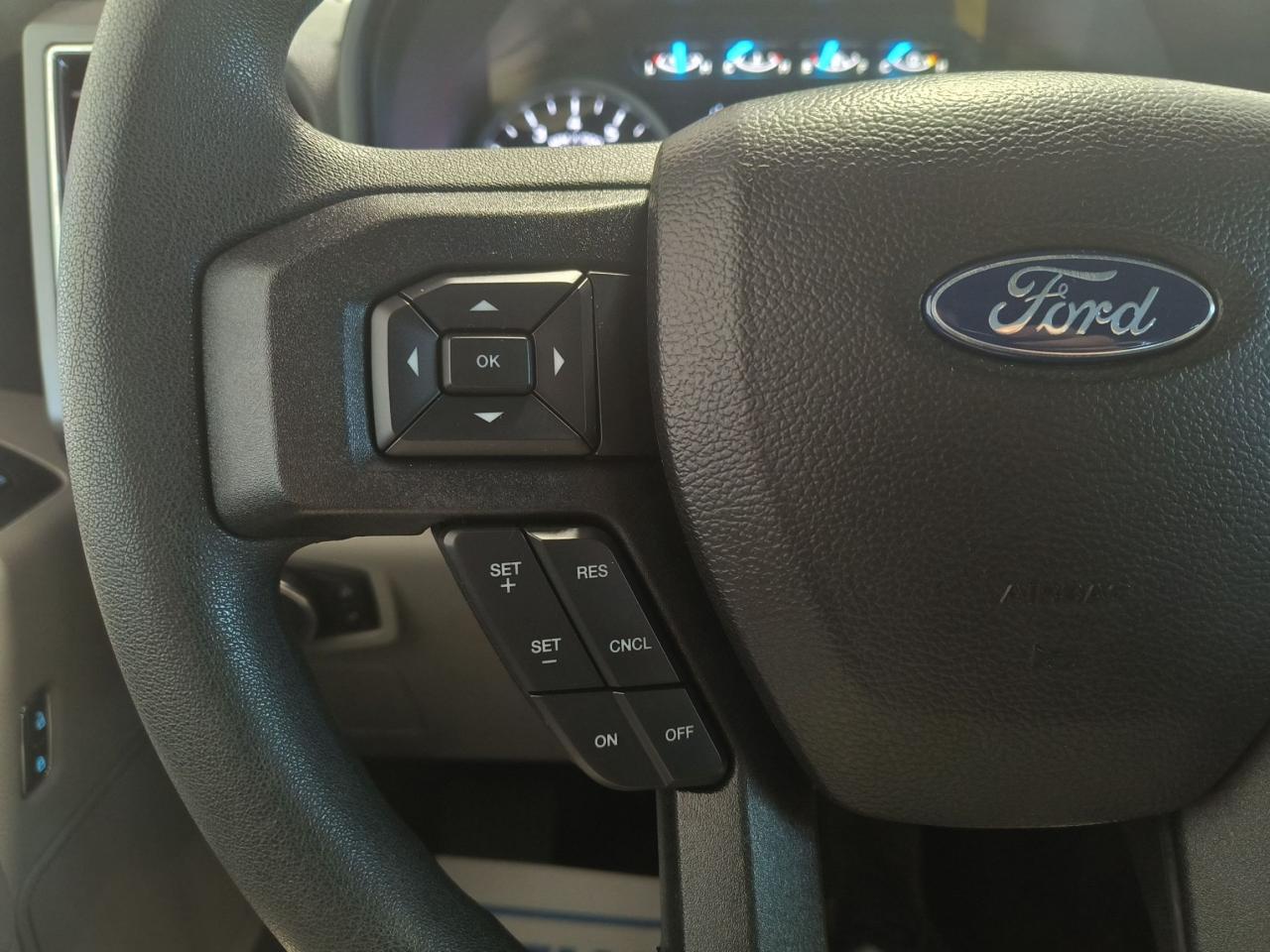 12640329