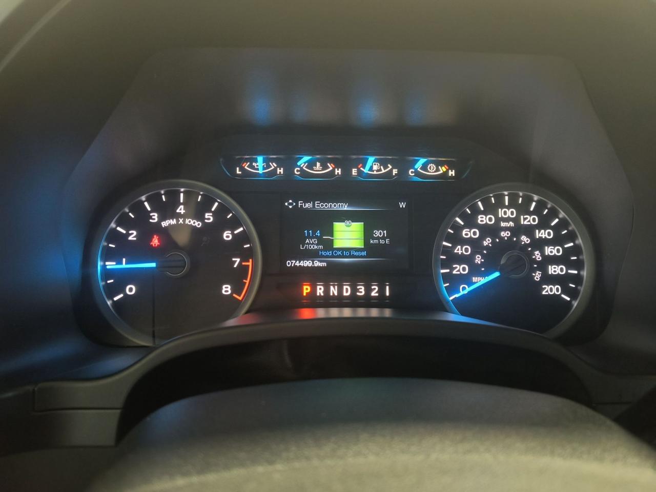 12640329