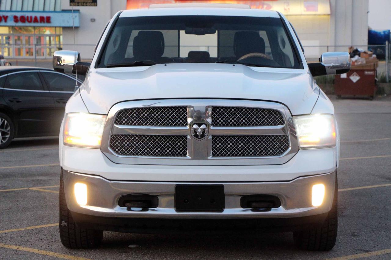 2013 RAM 1500 4WD Crew Cab 140.5" Laramie Longhorn - Photo #2