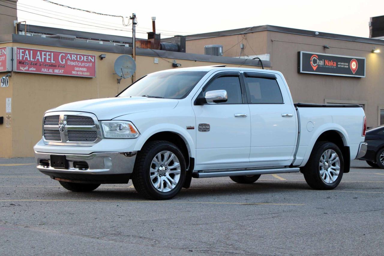 2013 RAM 1500 4WD Crew Cab 140.5" Laramie Longhorn - Photo #3