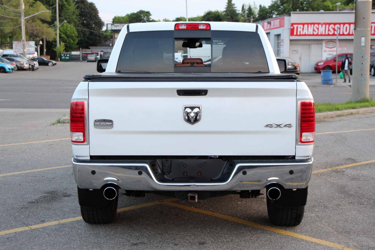 2013 RAM 1500 4WD Crew Cab 140.5" Laramie Longhorn - Photo #6