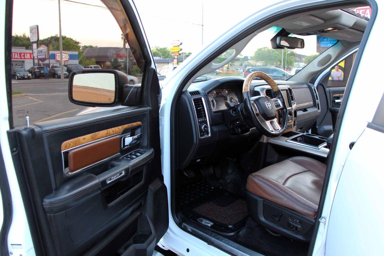2013 RAM 1500 4WD Crew Cab 140.5" Laramie Longhorn - Photo #15