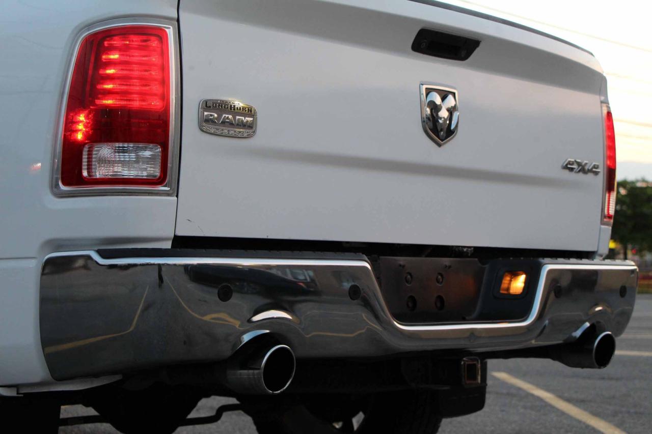 2013 RAM 1500 4WD Crew Cab 140.5" Laramie Longhorn - Photo #30