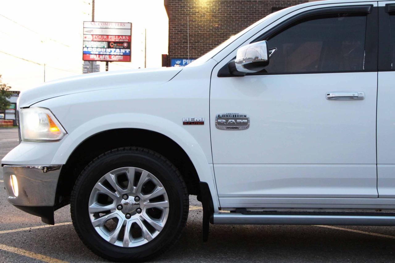 2013 RAM 1500 4WD Crew Cab 140.5" Laramie Longhorn - Photo #31