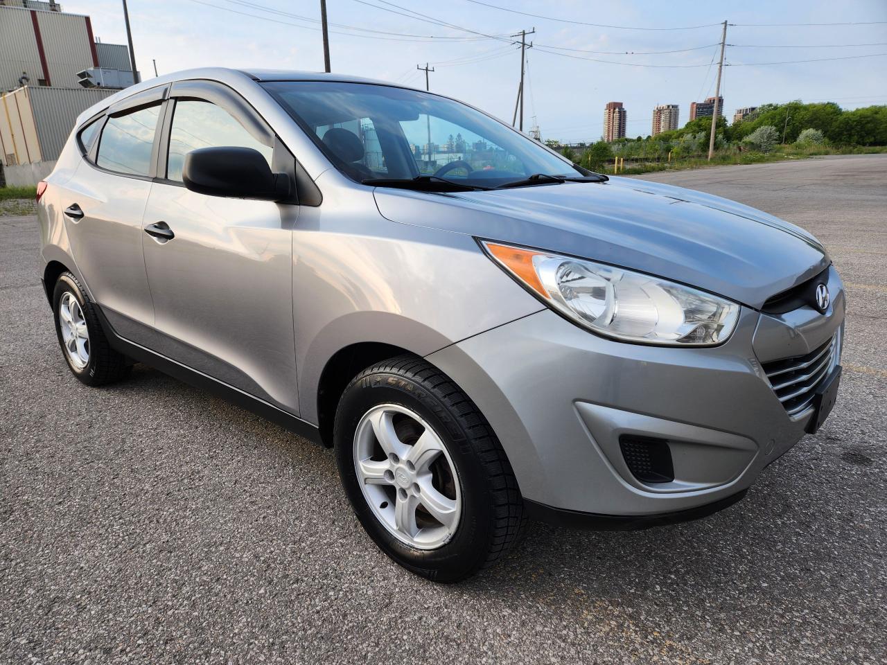 2012 Hyundai Tucson Certified $5995 AWD 4 Cyl. - Photo #6