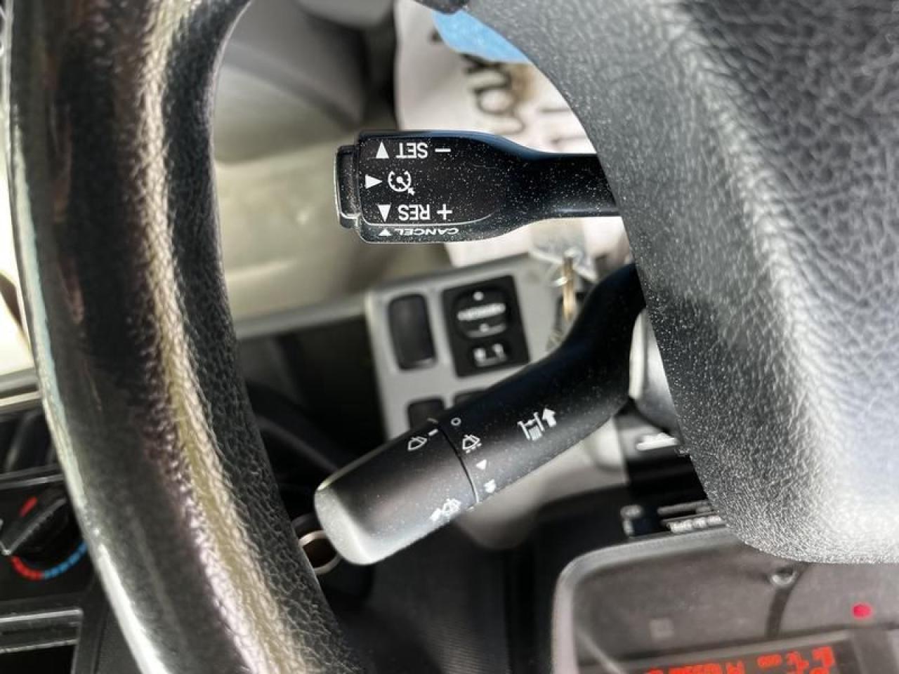12643884