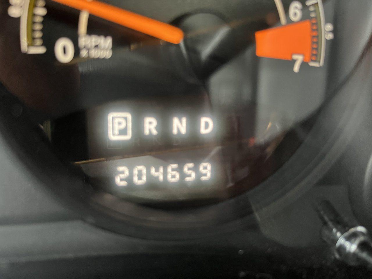 12647712