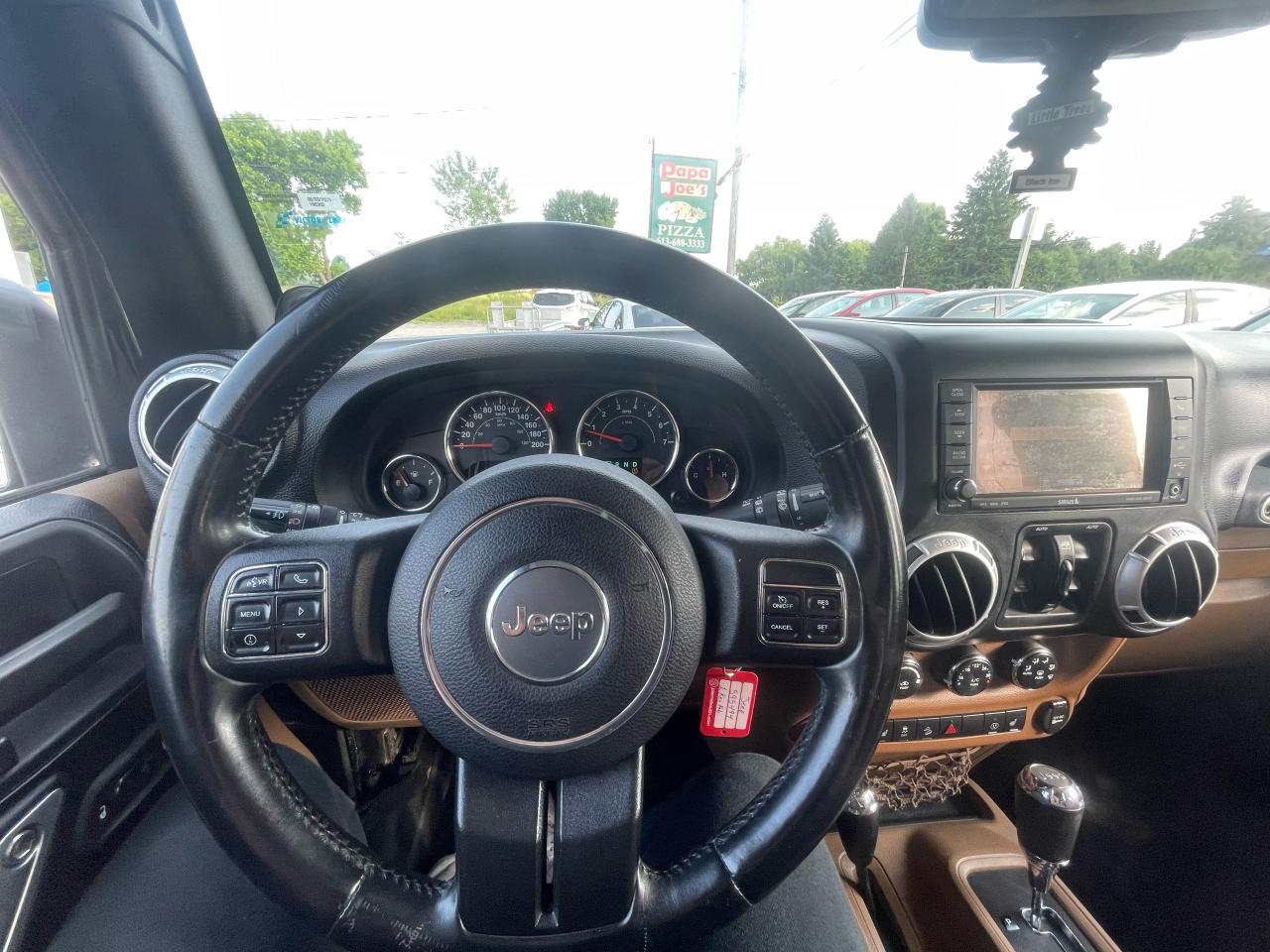 2013 Jeep Wrangler Sahara - Photo #12