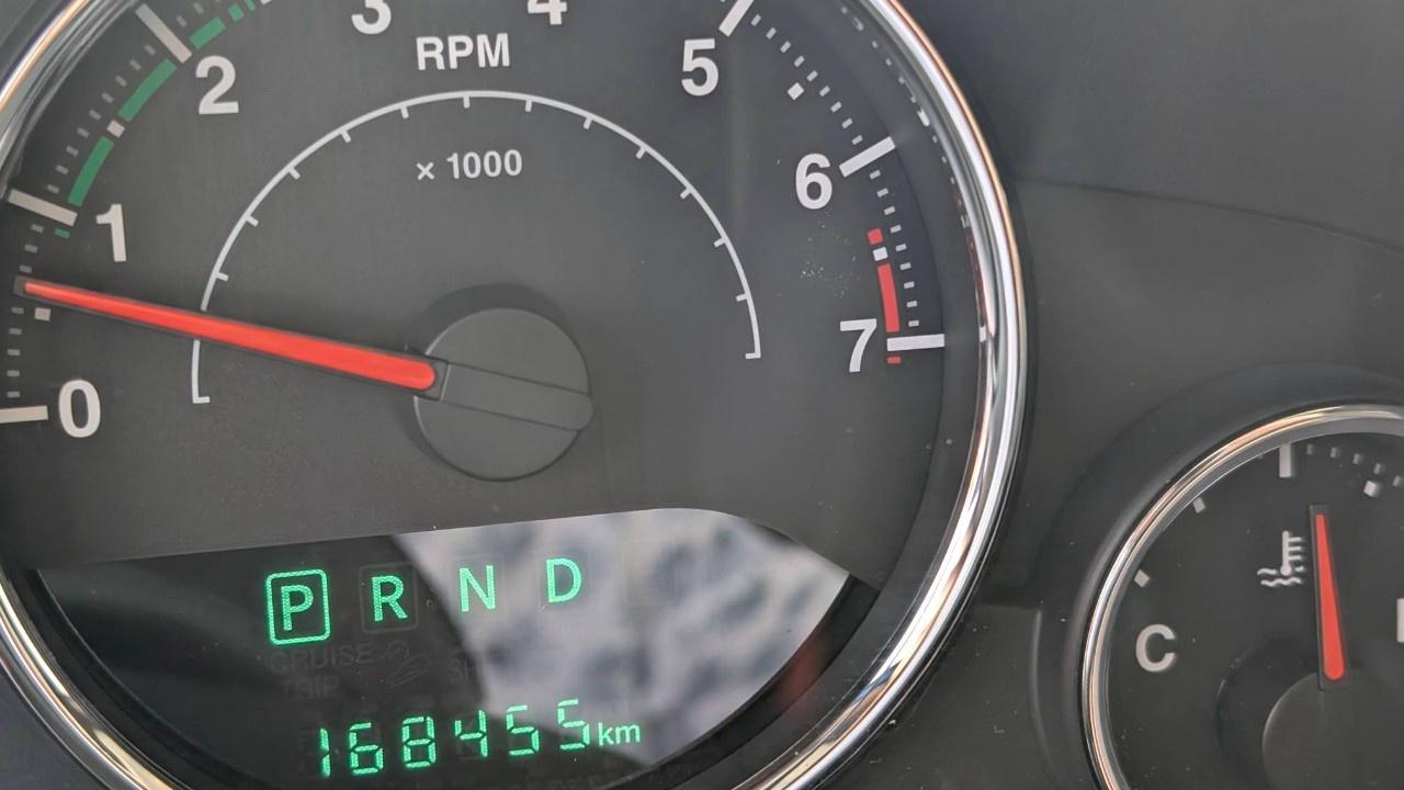 12653115