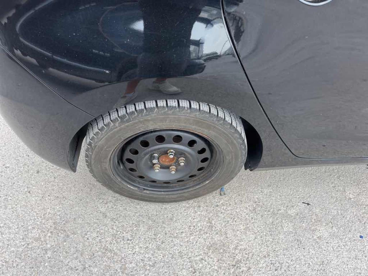 12653352