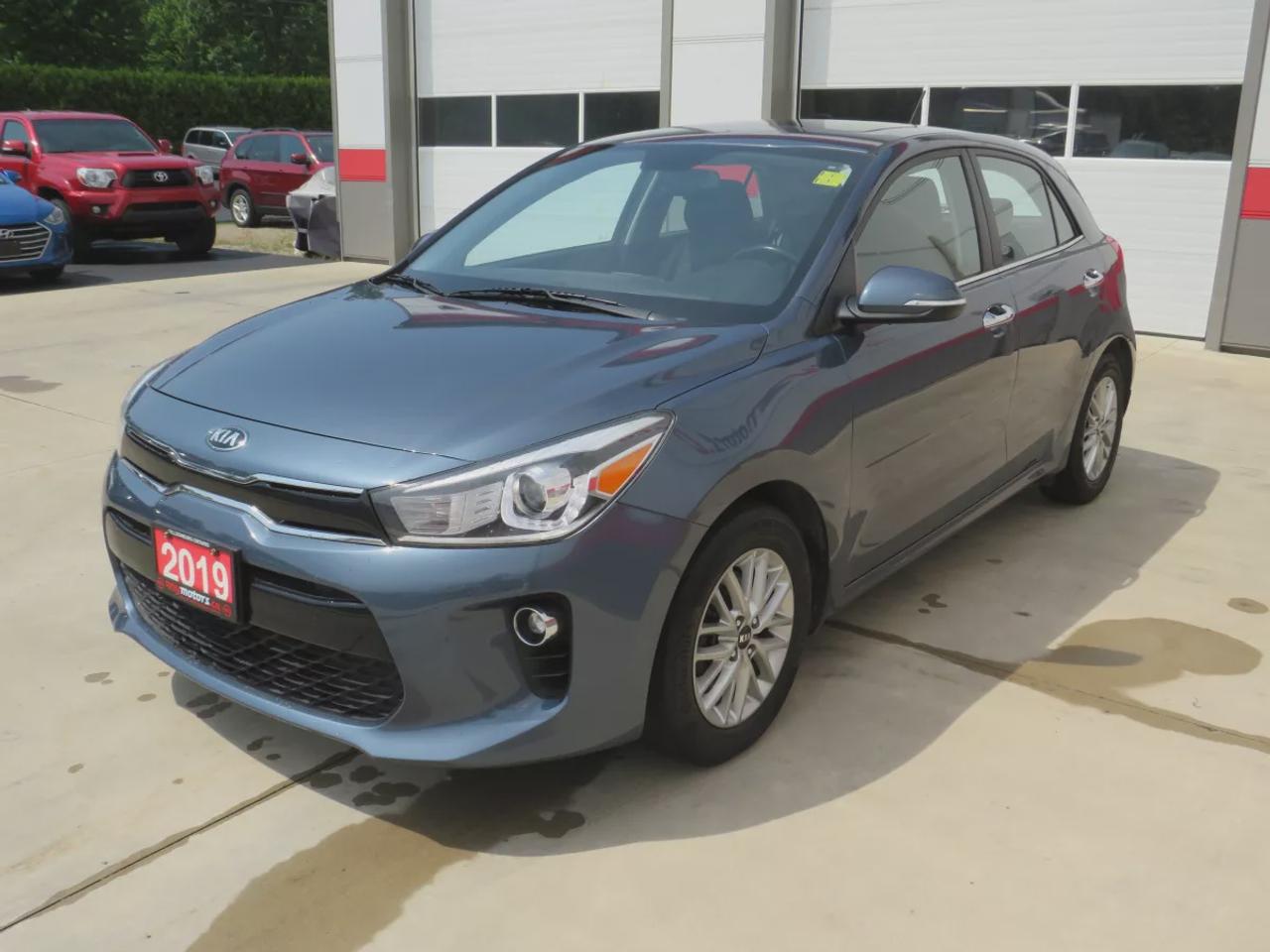 2019 Kia Rio 5-Door EX  | Safety Certified | Alloy Rims | Sunroof | Heated Seats & Steering Wheel | Leather Wrapped Steering Wheel | Reverse Camera | Sport Mode | Digital Touchscreen | Push Button Start | Cruise Control | Bluetooth | USB | AUX Photo