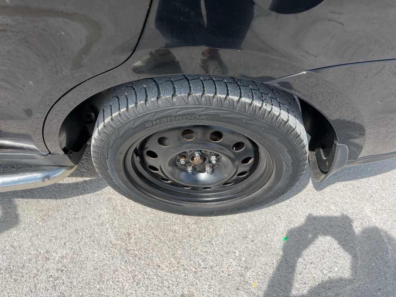 12657372
