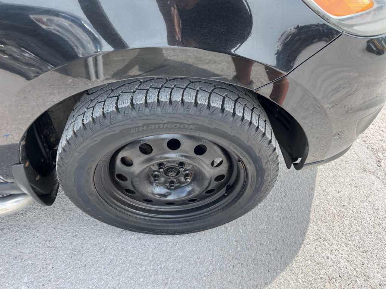 12657372
