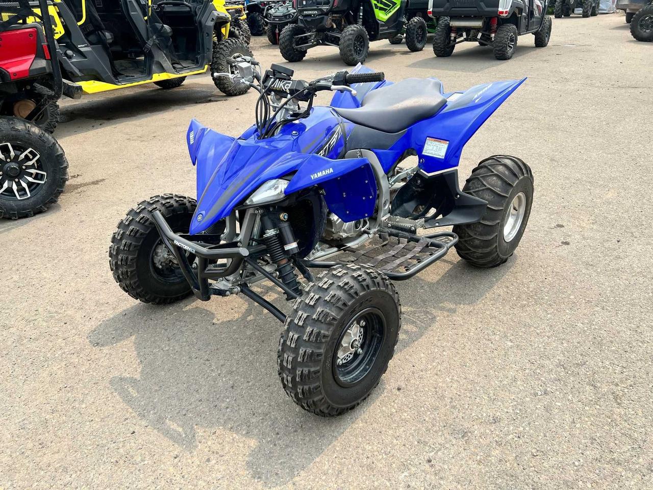 <p data-start=130 data-end=508>The 2023 Yamaha YFZ450R is built to dominate motocross tracks and aggressive trails with championship-winning power, precision, and rider-focused engineering. Powered by a high-performance 449cc fuel-injected DOHC engine with titanium valves, this race-bred machine delivers explosive throttle response and class-leading acceleration&mdash;purpose-tuned to keep you ahead of the pack.</p><p data-start=130 data-end=508>&nbsp;</p><p data-start=510 data-end=955>Purpose-built for serious sport riders, the YFZ450R features a lightweight hybrid aluminum/steel chassis, long-travel KYB piggyback shocks, and an assist-and-slipper clutch for aggressive downshifts and razor-sharp cornering. With 21&rdquo; front and 20&rdquo; rear Maxxis tires mounted on lightweight aluminum wheels, it grips confidently across ruts, berms, and big jumps&mdash;while the wide stance and low center of gravity ensure superior stability at speed.</p><p data-start=510 data-end=955>&nbsp;</p><p data-start=957 data-end=1285>This performance ATV also comes equipped with motocross-style ergonomics, adjustable handlebars, a race-ready seat profile, and a high-flow intake system built for relentless laps. Inside, you&rsquo;ll find a rider-focused cockpit designed for control, comfort, and confidence&mdash;whether you&rsquo;re chasing podiums or ripping through trails.</p><p data-start=121 data-end=440>&nbsp;</p><p data-start=1287 data-end=1453 data-is-last-node= data-is-only-node=>Call or message us today to learn more about financing, trade-ins, or delivery across Canada. The 2023 Yamaha YFZ450R&mdash;built to win, bred for speed, and ready to ride.</p>