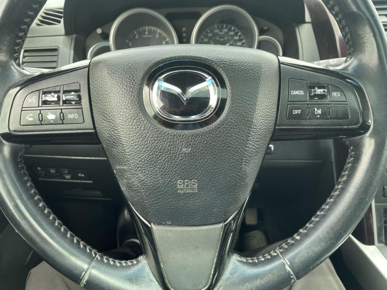 12657573