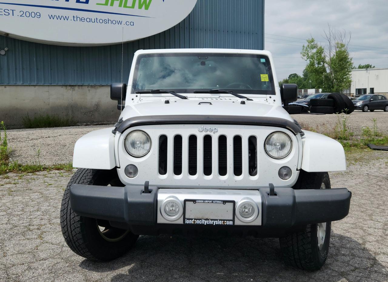 2014 Jeep Wrangler Sahara Photo18