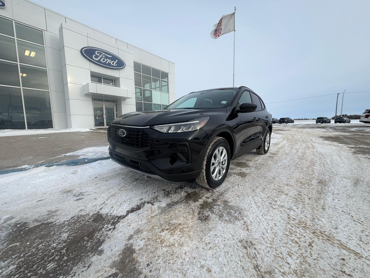 <p>Looking for a versatile and stylish SUV thats ready for anything? Check out the brand-new 2025 Ford Escape 4DR ACTIVE, now available at Webbs 1441! This sleek SUV, finished in a stunning Agate Black Metallic, is designed to turn heads while providing a comfortable and connected driving experience. With its modern design and practical features, the Escape is perfect for both city adventures and weekend getaways.</p><p>&nbsp;</p><p>This Escape is packed with features to enhance your driving experience. Enjoy the convenience of an automatic transmission and all-wheel drive, ensuring a smooth and confident ride in any weather. The spacious interior, featuring comfortable cloth bucket seats, offers plenty of room for passengers and cargo. Plus, with its advanced technology and safety features, you can drive with peace of mind knowing youre well-protected.</p><p>&nbsp;</p><p>Here are five standout features that make this 2025 Ford Escape a must-see:</p><p><br /><br /></p><ul><ul><li><strong>Panoramic Vista Roof:</strong> Open up the cabin and enjoy breathtaking views of the sky.</li></ul></ul><p>&nbsp;</p><ul><ul><li><strong>Heated Steering Wheel:</strong> Stay cozy and comfortable during those chilly Canadian winters.</li></ul></ul><p>&nbsp;</p><ul><ul><li><strong>B&O Audio System:</strong> Immerse yourself in premium sound quality with the 10-speaker audio system.</li></ul></ul><p>&nbsp;</p><ul><ul><li><strong>Power Liftgate:</strong> Effortlessly load and unload cargo with the touch of a button.</li></ul></ul><p>&nbsp;</p><ul><ul><li><strong>Adaptive Cruise Control:</strong> Enjoy a more relaxed and safer driving experience on the highway.</li></ul></ul><p><br /><br /></p><p><strong><em>Powered by AutoIntelligence&trade;</em></strong><br />Vehicle information has been generated using artificial intelligence and is provided for informational purposes only. While efforts are made to ensure accuracy, please confirm all details directly with the dealer.</p><p>&nbsp;</p>