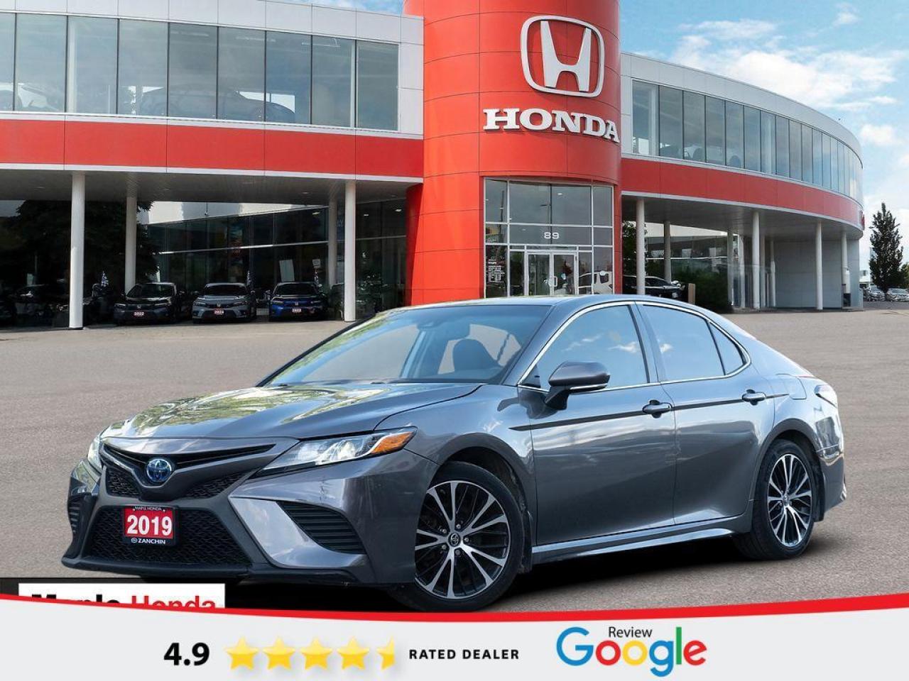 2.5L I4 DOHC 16V.
2019 Toyota Camry Hybrid SE Sunroof| Heated Seats| Good Condition|


SE Sunroof| Heated Seats| Good Condition| FWD CVT 2.5L I4 DOHC 16V


Why Buy from Maple Honda? REVIEWS: Why buy an used car from Maple Honda? Our reviews will answer the question for you. We have over 2,500 Google reviews and have an average score of 4.9 out of a possible 5. Who better to trust when buying an used car than the people who have already done so? DEPENDABLE DEALER: The Zanchin Group of companies has been providing new and used vehicles in Vaughan for over 40 years. Since 1973 our standards of excellent service and customer care has enabled us to grow to over 34 stores in the Great Toronto area and beyond. Still family owned and still providing exceptional customer care. WARRANTY / PROTECTION: Buying an used vehicle from Maple Honda is always a safe and sound investment. We know you want to be confident in your choice and we want you to be fully satisfied. That’s why ALL our used vehicles come with our limited warranty peace of mind package included in the price. No questions, no discussion - 30 days safety related items only. From the day you pick up your new car you can rest assured that we have you covered. TRADE-INS: We want your trade! Looking for the best price for your car? Our trade-in process is simple, quick and easy. You get the best price for your car with a transparent, market-leading value within a few minutes whether you are buying a new one from us or not. Our Used Sales Department is ALWAYS in need of fresh vehicles. Selling your car? Contact us for a value that will make you happy and get paid the same day. Https:/www.maplehonda.com.

Easy to buy, easy for servicing. You can find us in the Maple Auto Mall on Jane Street north of Rutherford. We are close both Canada’s Wonderland and Vaughan Mills shopping centre. Easy to call in while you are shopping or visiting Wonderland, Maple Honda provides used Honda cars and trucks to buyers all over the GTA including, Toronto, Scarborough, Vaughan, Markham, and Richmond Hill. Our low used car prices attract buyers from as far away as Oshawa, Pickering, Ajax, Whitby and even the Mississauga and Oakville areas of Ontario. We have provided amazing customer service to Honda vehicle owners for over 40 years. As part of the Zanchin Auto group we offer dependable service and excellent customer care. We are here for you and your Honda.