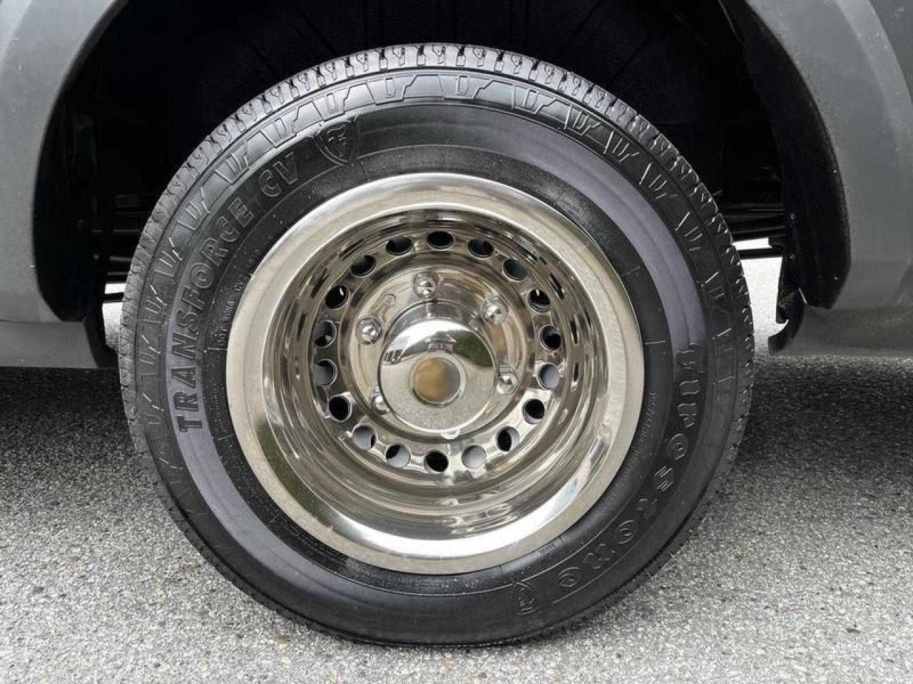 12665595