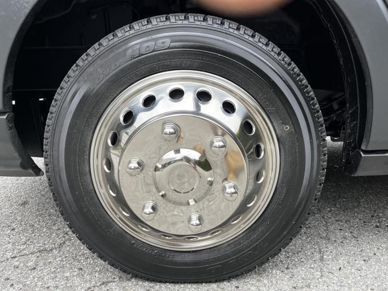 12665595