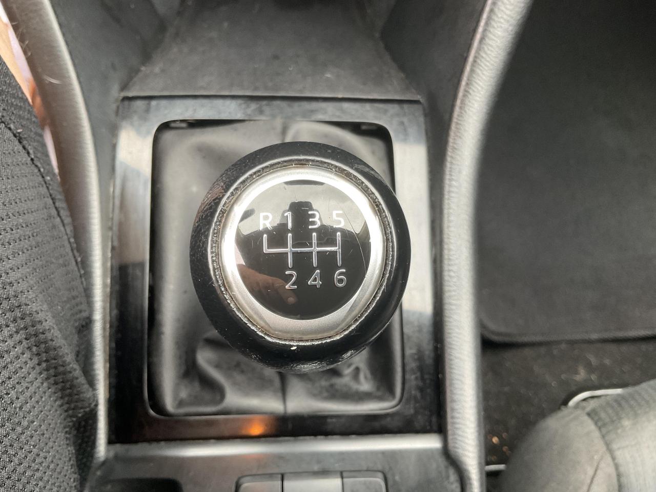 12667305