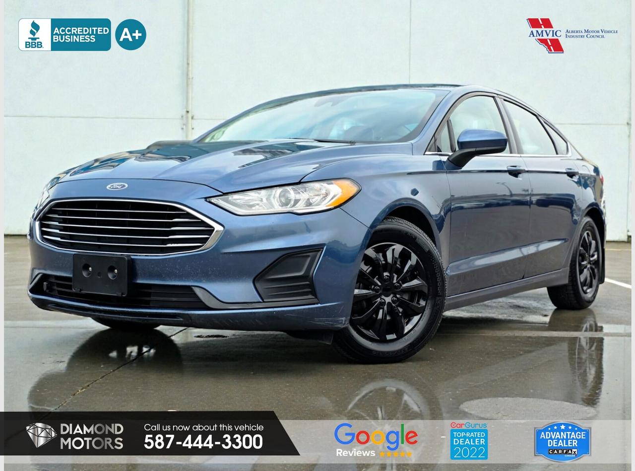 CLEARANCE PRICED  PRICED TO MOVE <br/> LIMITED TIME at Diamond Motors <br/> Drive away with a FREE 1-Year Warranty + low payments included at Listed Price. T&Cs Apply. <br/> Just Arrived 2019 Ford Fusion SE Teal has 246,848 KM on it. 1.5L 4 Cylinder Engine engine, Front-Wheel Drive, Automatic transmission, 5 Seater passengers, on special price for $9,900.00. <br/> <br/> <br/> Book your appointment today for Test Drive. We offer contactless Test drives & Virtual Walkarounds. Stock Number: 25183 <br/> Disclosure: This vehicle was previously registered in BC. Vehicle has passed all required inspections in Alberta. <br/> At Diamond Motors, we are dedicated to providing you with an outstanding car-buying experience, offering quality pre-owned vehicles at prices that fit your budget. Our transparent and honest approach means you can expect straightforward guidance without any high-pressure sales tactics. We believe in building lasting relationships with our customers by offering personalized service tailored to your needs. From the moment you step onto our lot, our team is here to support you every step of the way, ensuring you leave confident in your decision. Trust, integrity, and customer satisfaction are the foundation of everything we do. <br/> <br/> <br/> Why choose us? <br/> <br/> Certified Pre-Owned Vehicles <br/> Family Owned & Operated <br/> Finance Available <br/> Extended Warranty <br/> Vehicles Priced to Sell <br/> No Pressure Environment <br/> Inspection & Carfax Report <br/> Professionally Detailed Vehicles <br/> Full Disclosure Guaranteed <br/> AMVIC Licensed <br/> BBB Accredited Business <br/> CarGurus Top-rated Dealer 2022 & 2024 <br/> <br/> <br/> Phone to schedule an appointment @ 587-444-3300 or simply browse our inventory online www.diamondmotors.ca or come and see us at our location at <br/> 3403 93 street NW, Edmonton, T6E 6A4 <br/> <br/> <br/> To view the rest of our inventory: <br/> www.diamondmotors.ca/inventory <br/> This dealership provides all required disclosures in accordance with AMVIC regulations. A completed Mechanical Fitness Assessment and its associated inspection work order will be supplied with every vehicle. A Carfax (or equivalent) vehicle history report will also be provided, including available information on previous damage, accident history, stolen or salvage status, and jurisdictional records. <br/> Customers are encouraged to review all vehicle features, options, and equipment for accuracy prior to purchase. <br/>