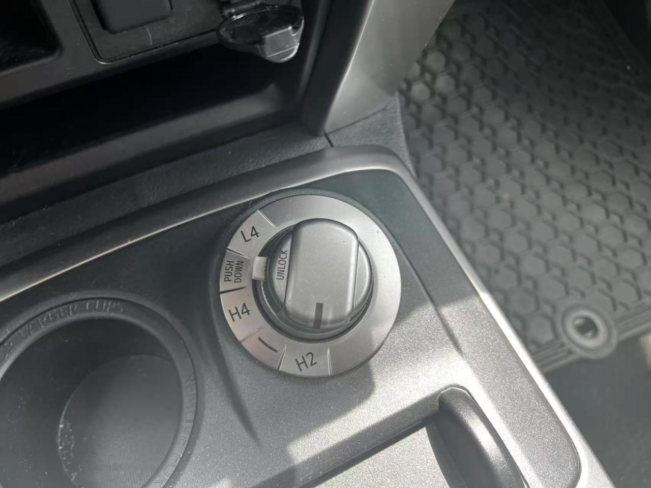 12667977